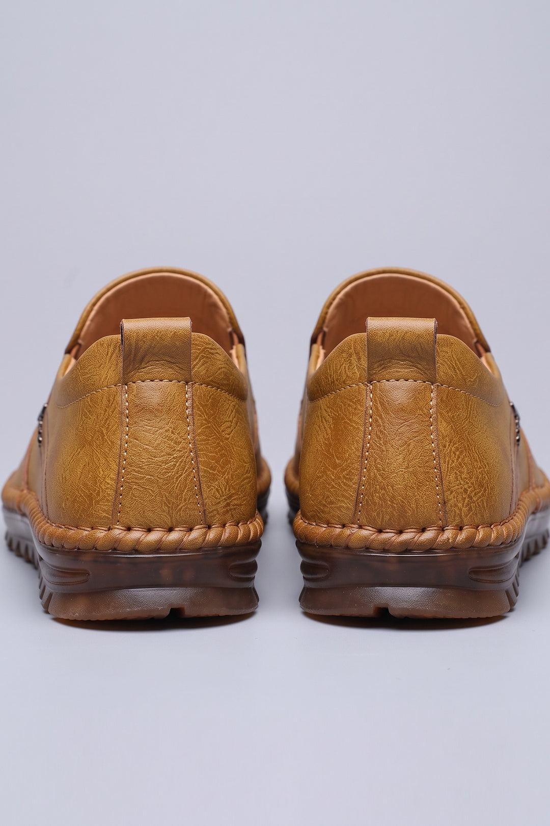 Men's Slip-On Loafers | Moc-Toe Stitching — Intense Orange — shoe_back — on model