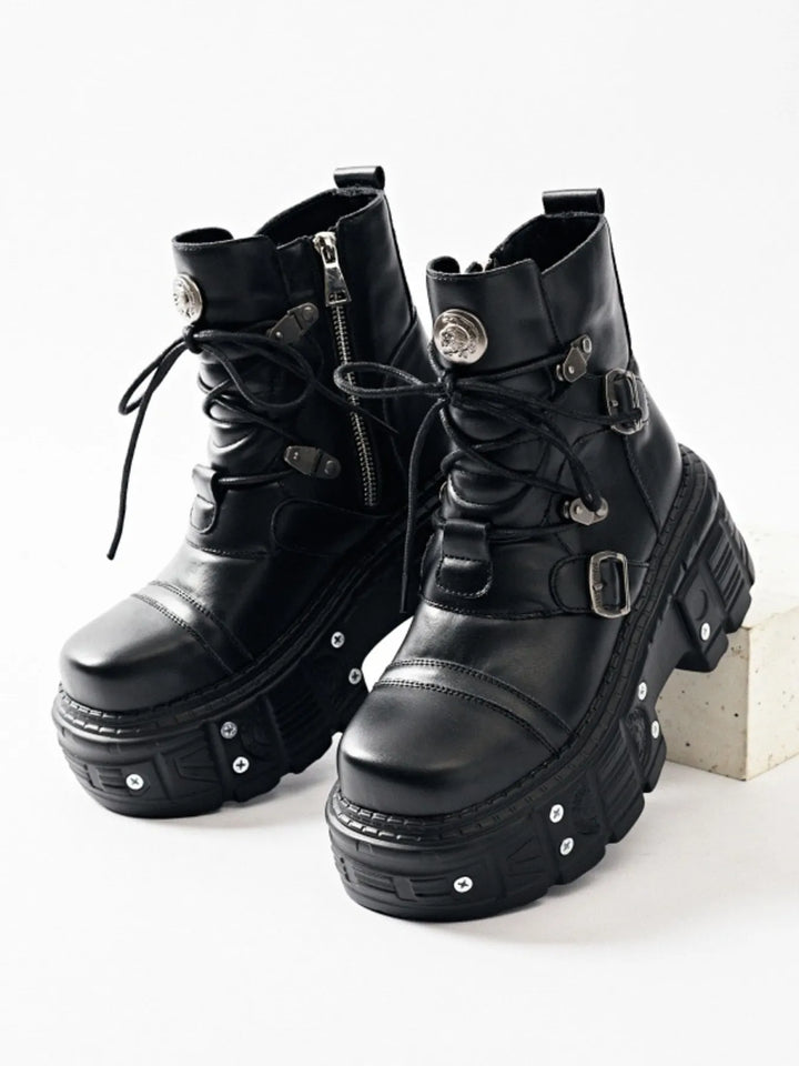 Women's ankle boots in black, chunky platform pair with lace up and buckle straps