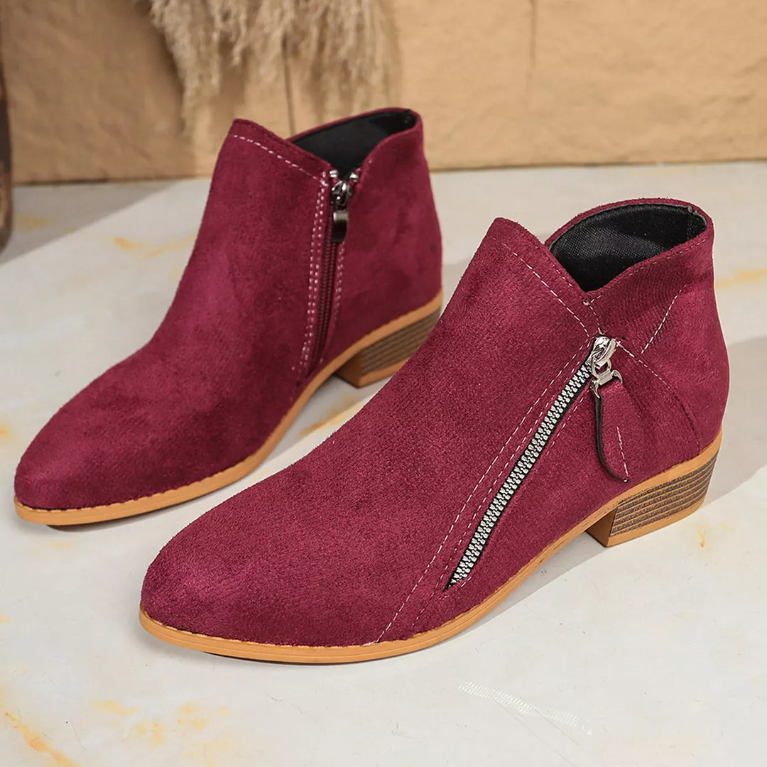 Pair of burgundy pointed toe ankle boots with block heel