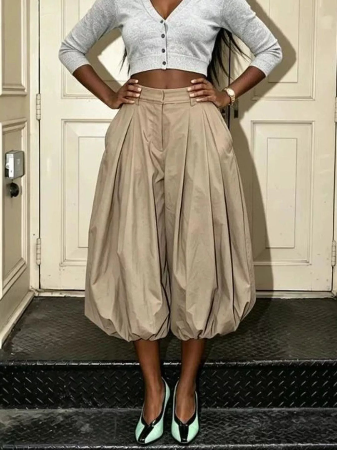 Women's balloon pants in khaki with a high waisted pleated bubble silhouette
