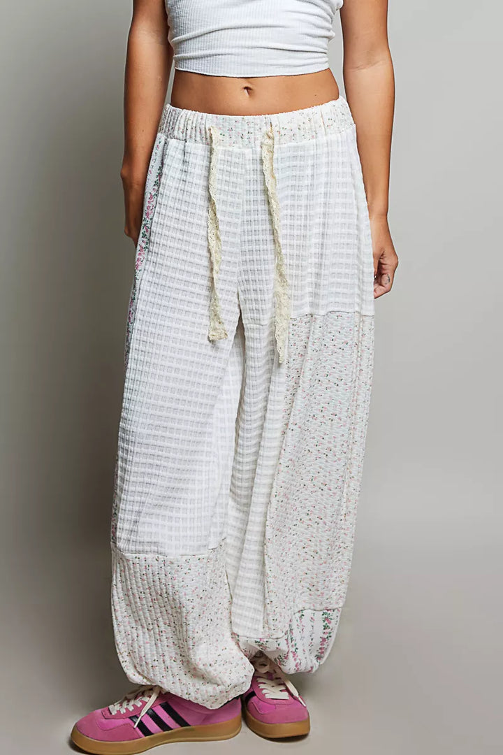 Women's balloon pants in ivory, wide leg drawstring patchwork waffle knit, front view