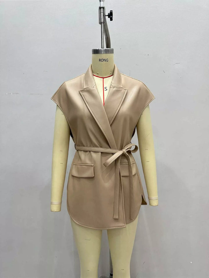 Camel wrap style vest with belt displayed on a mannequin