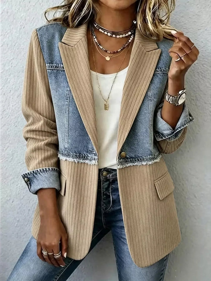 Beige patchwork blazer jacket with denim panels worn over a white top