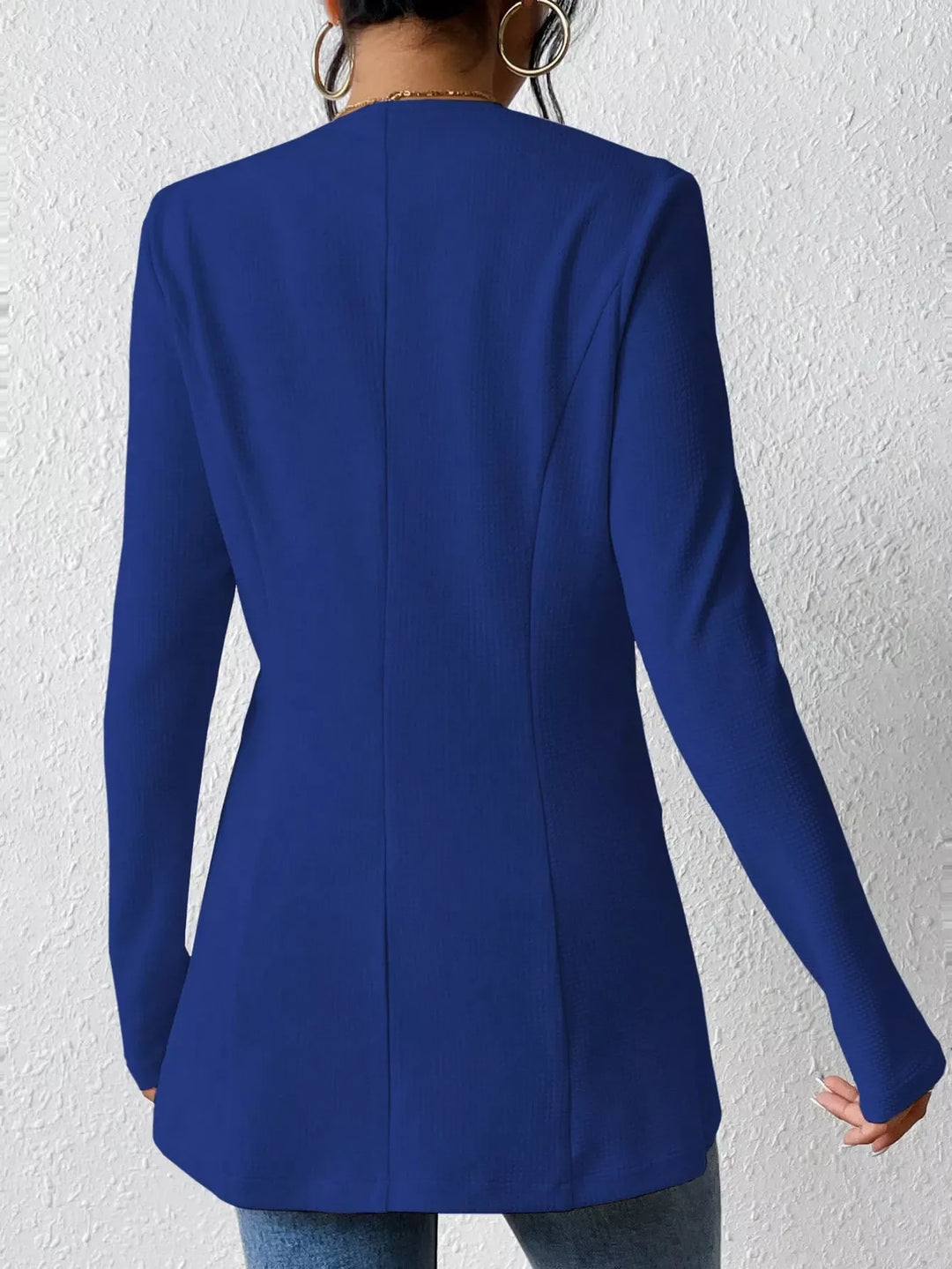 Back view of the royal blue blazer with a tailored fit