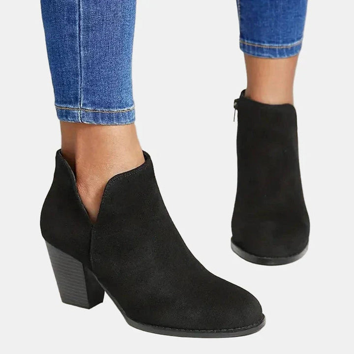 Black bootie with V-cut shaft and round toe