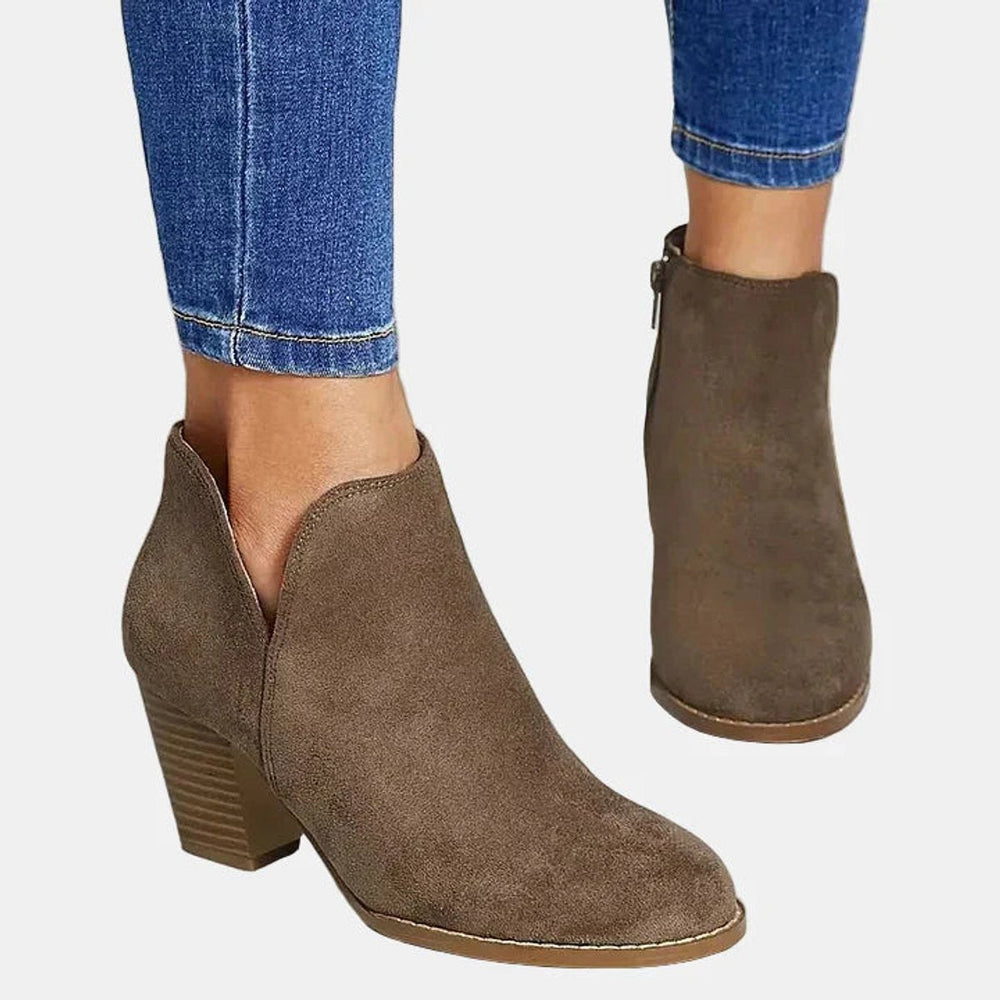 Taupe suede-look bootie showing the V-cut on the outer side