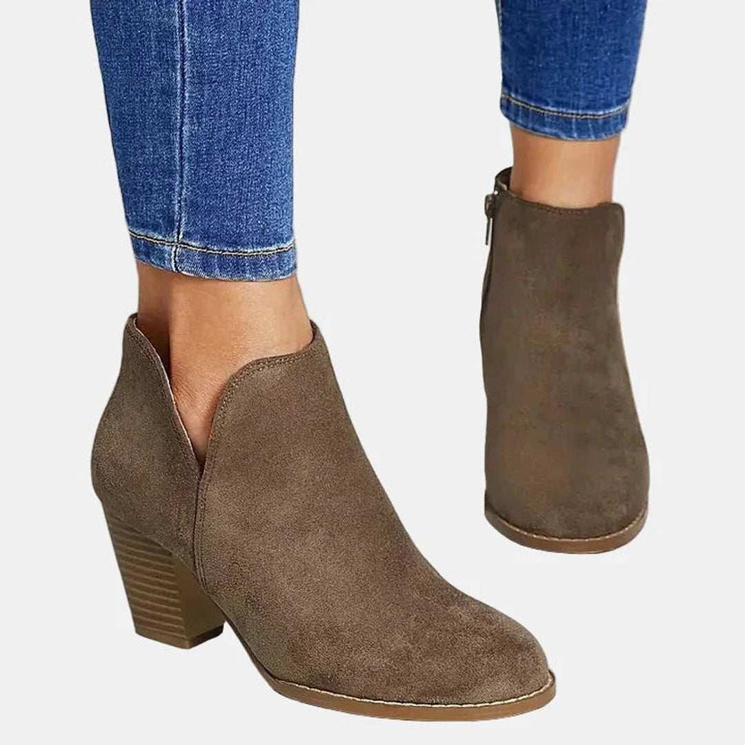 Taupe suede-look bootie showing the V-cut on the outer side