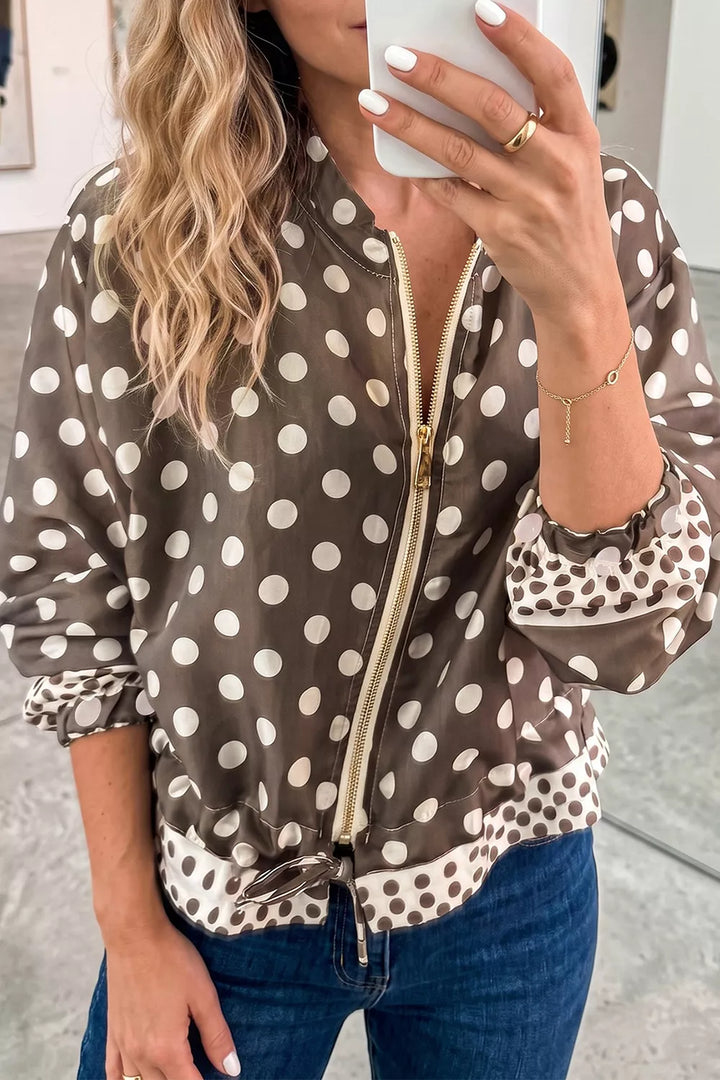 Women's bomber jacket in taupe, lightweight polka dot zip up, mirror selfie with jeans