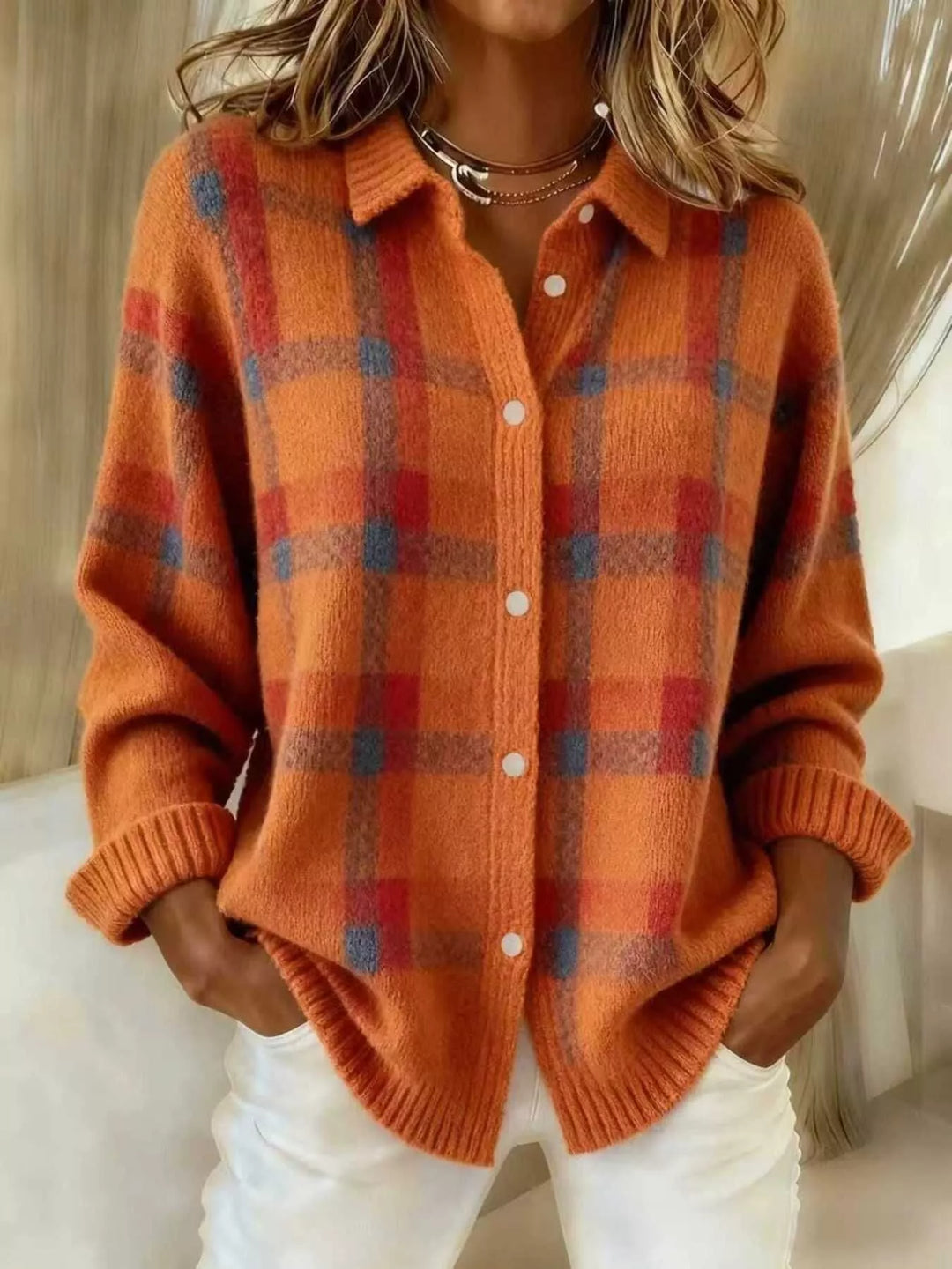 Orange plaid fuzzy knit cardigan with point collar, front view