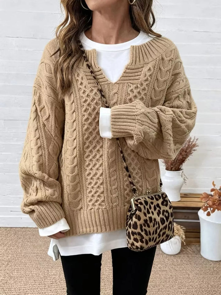 Khaki oversized cable knit v neck sweater with side slits, front view