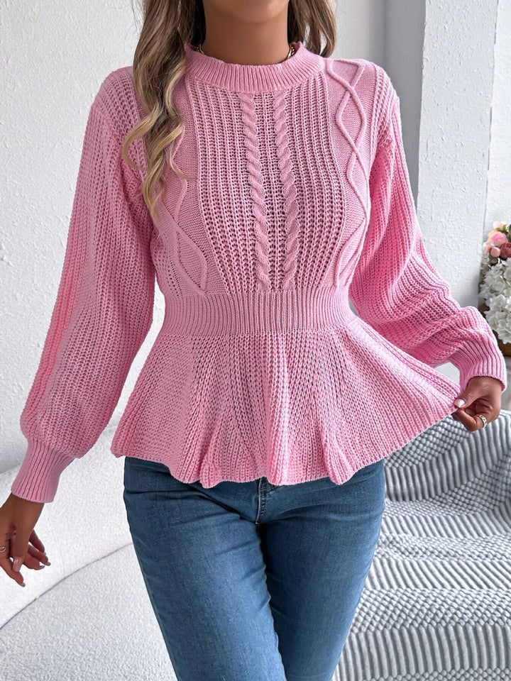 Pink peplum hem crew neck sweater styled with blue jeans and a chain bag