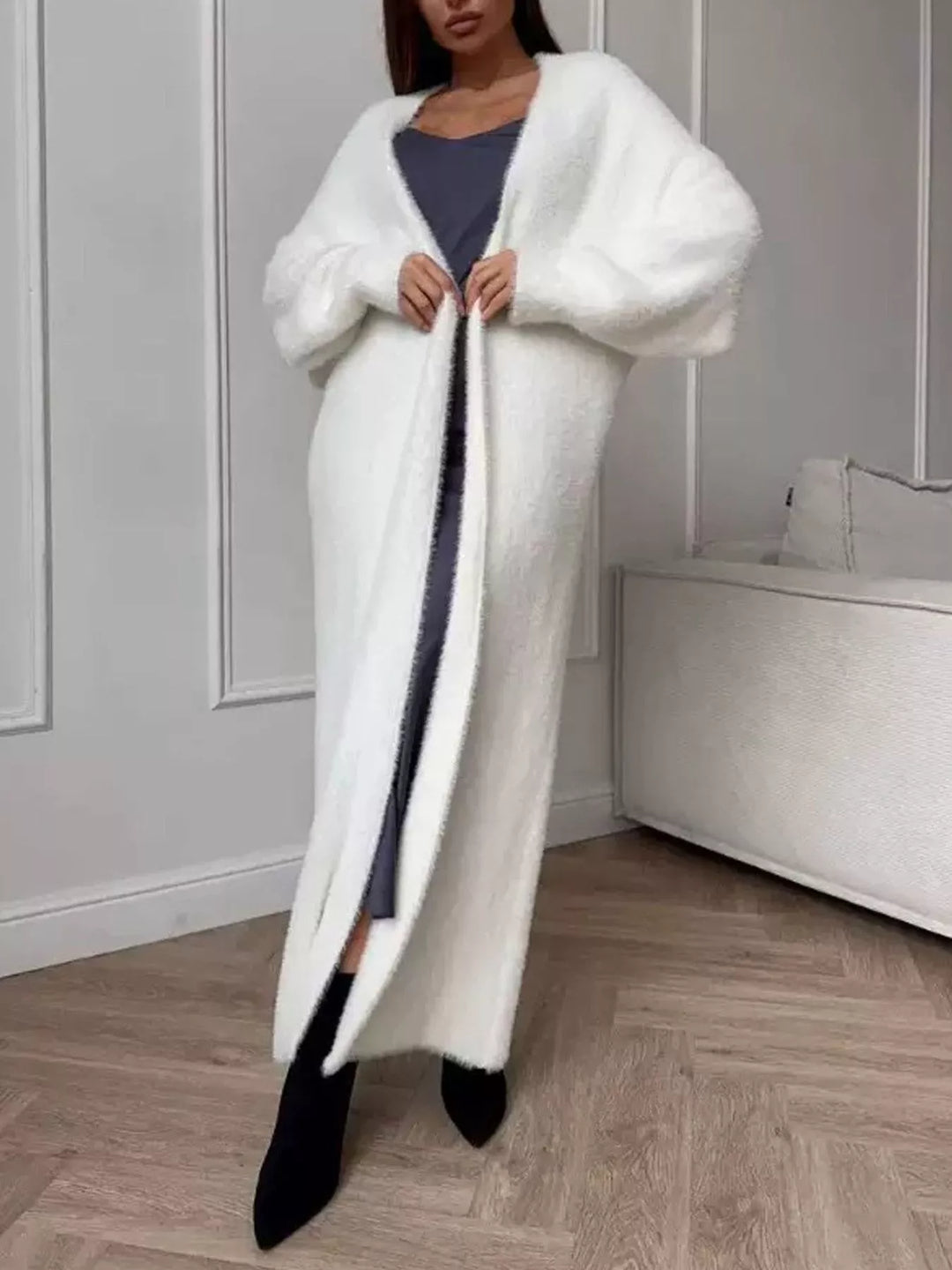 Ivory fuzzy longline open front cardigan full length with black boots