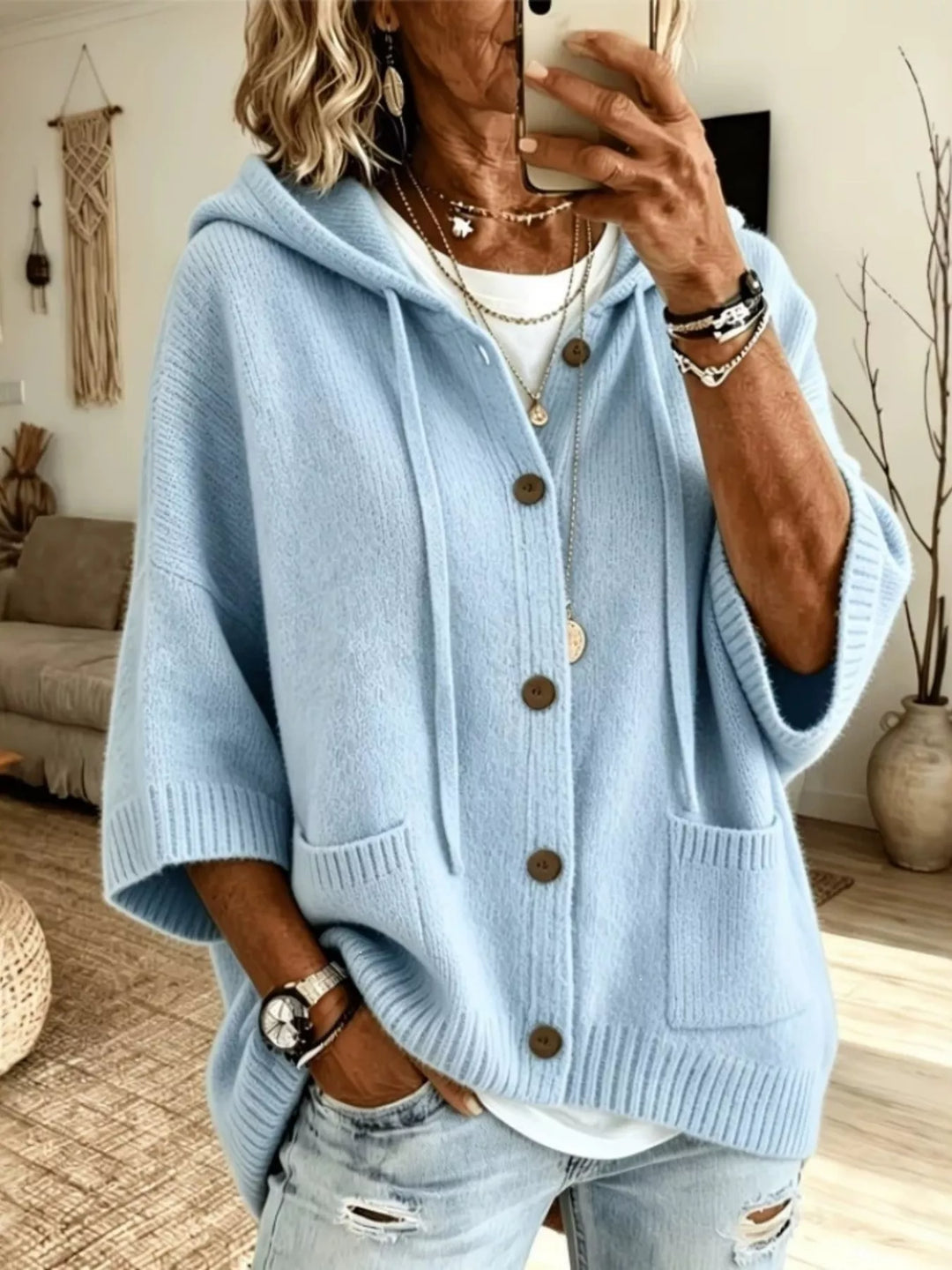 Light blue hooded cardigan with batwing sleeves and front patch pockets