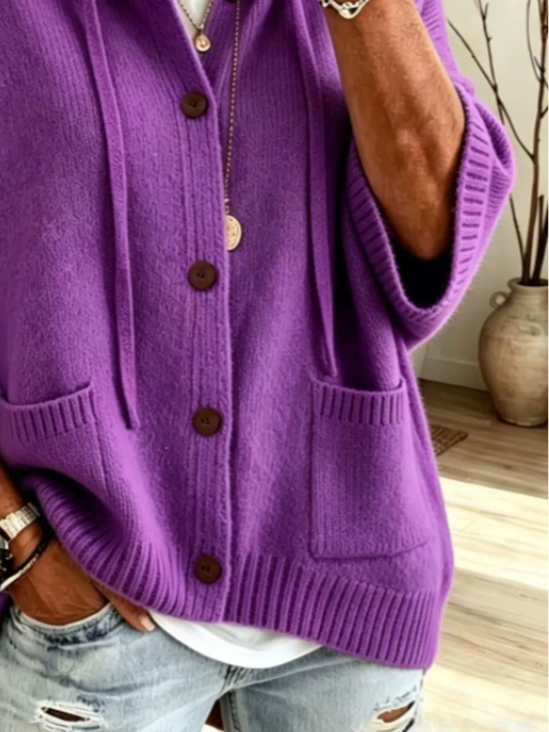 Purple batwing sleeve cardigan close-up of the buttons and hem