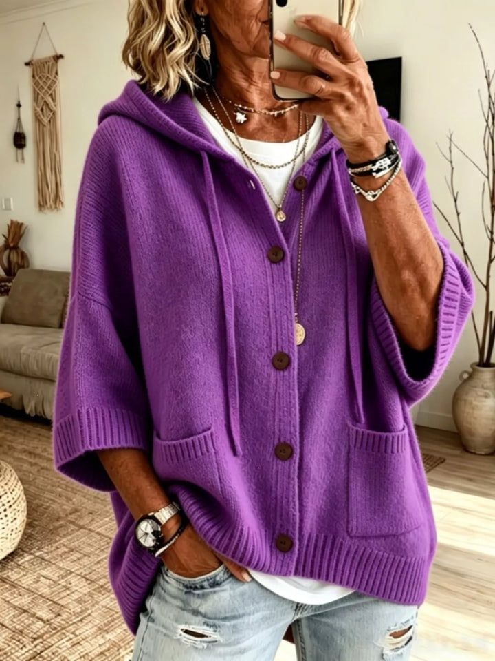 Purple hooded button front cardigan with batwing sleeves and pockets