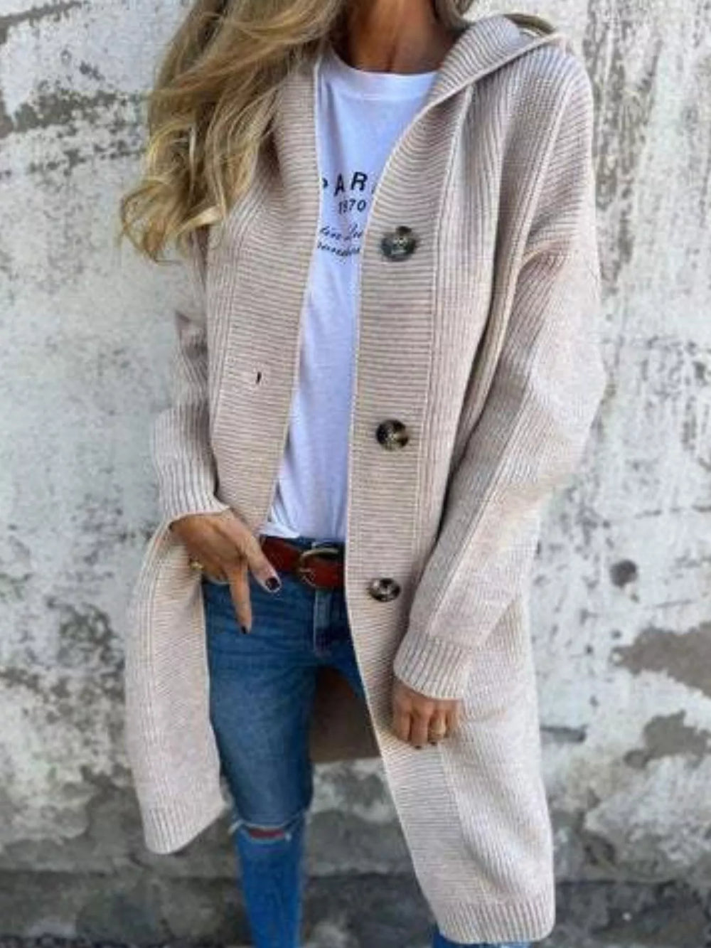 Oatmeal long cardigan styled open with a white tee and ripped jeans