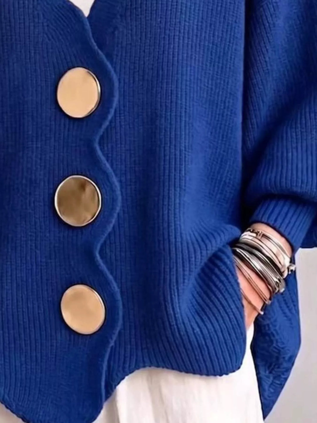 Royal blue cardigan button front and scalloped hem, hand in pocket detail