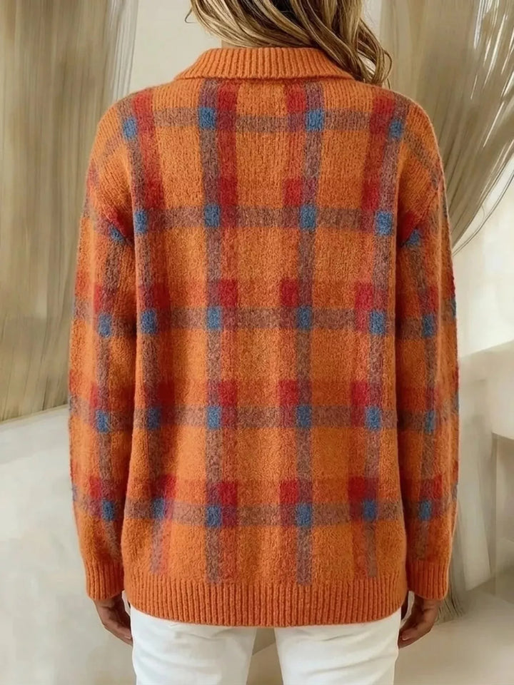 Back view of the orange plaid cardigan with ribbed hem