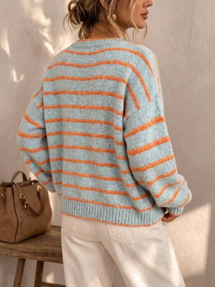 Back view of the light blue striped crew neck cardigan