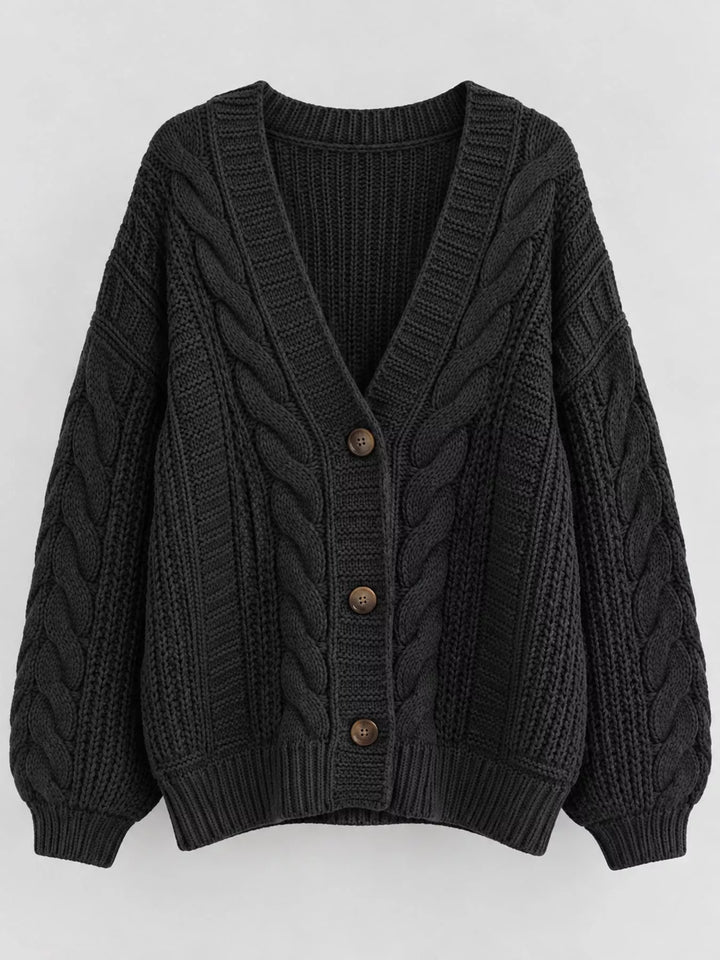 Chunky cable knit button front v-neck in black, flat lay