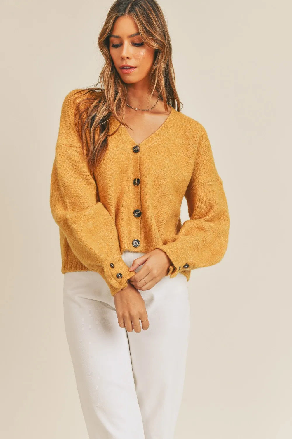 Cropped v-neck balloon sleeve in mustard, front view 2