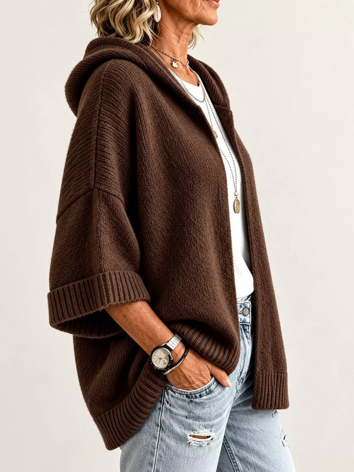 Hooded open front drop shoulder in brown, styled on model