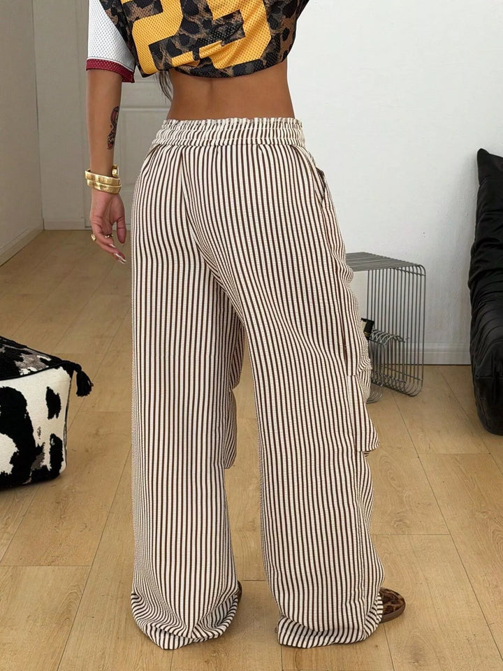 Back view of the brown pinstripe cargo pants with elastic waist