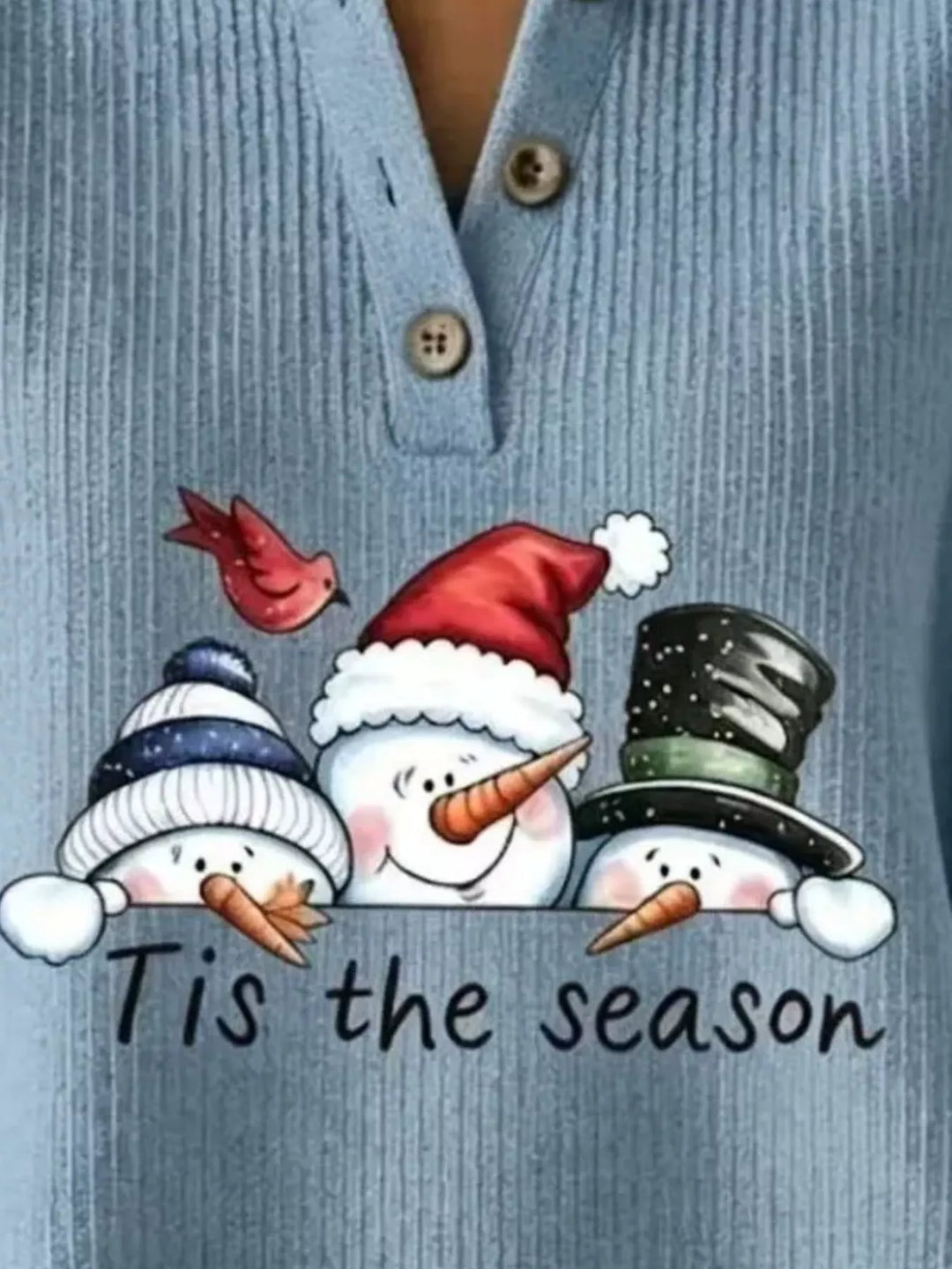 Snowman graphic henley placket in air force blue, close-up detail