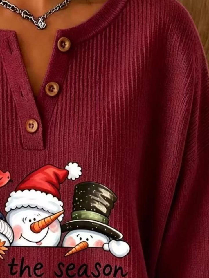 Snowman graphic henley placket in burgundy, close-up detail