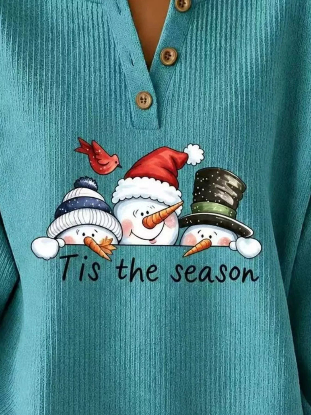 Snowman graphic henley placket in turquoise, close-up detail