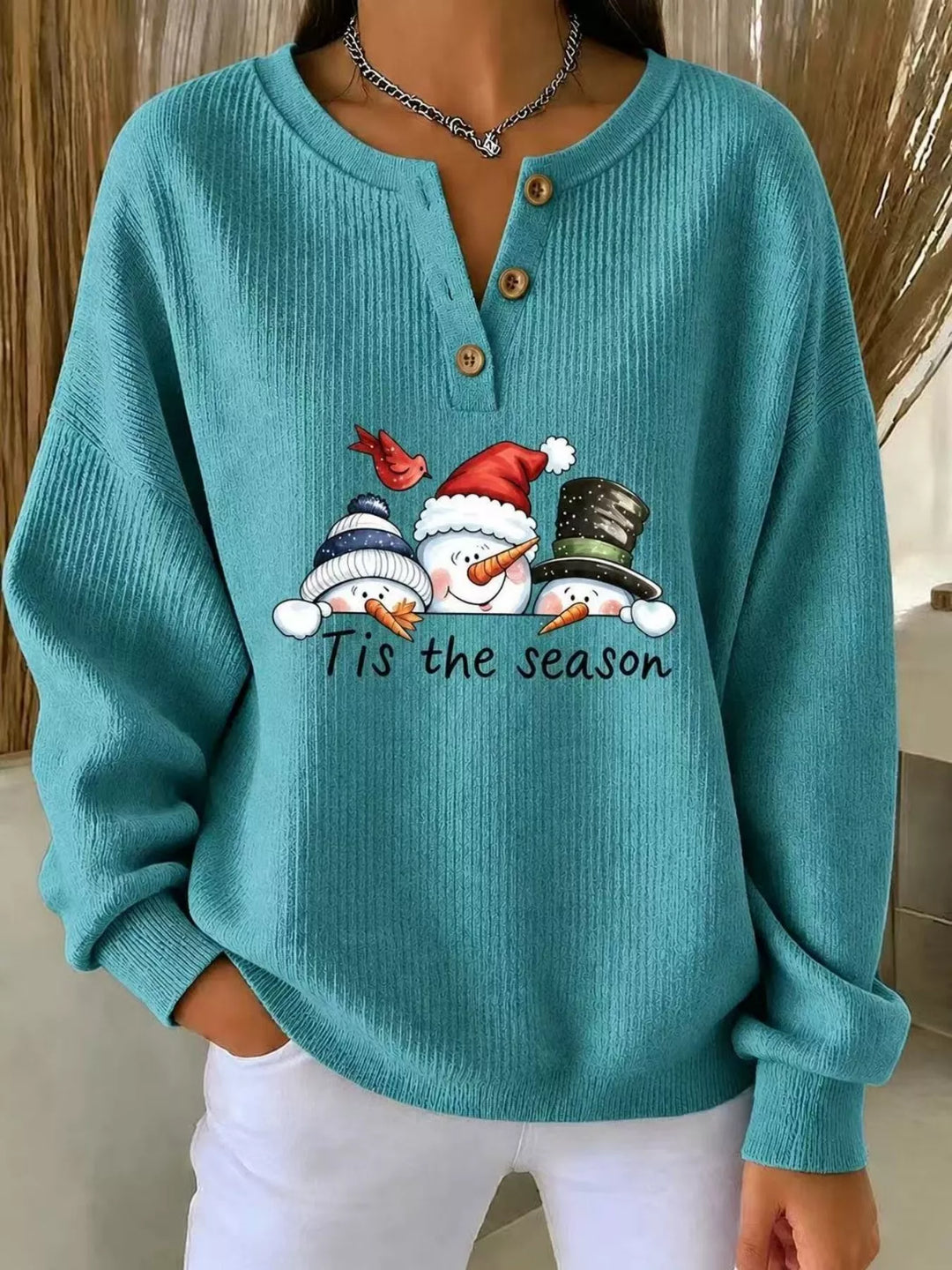 Women's christmas sweatshirt in turquoise, snowman graphic henley placket