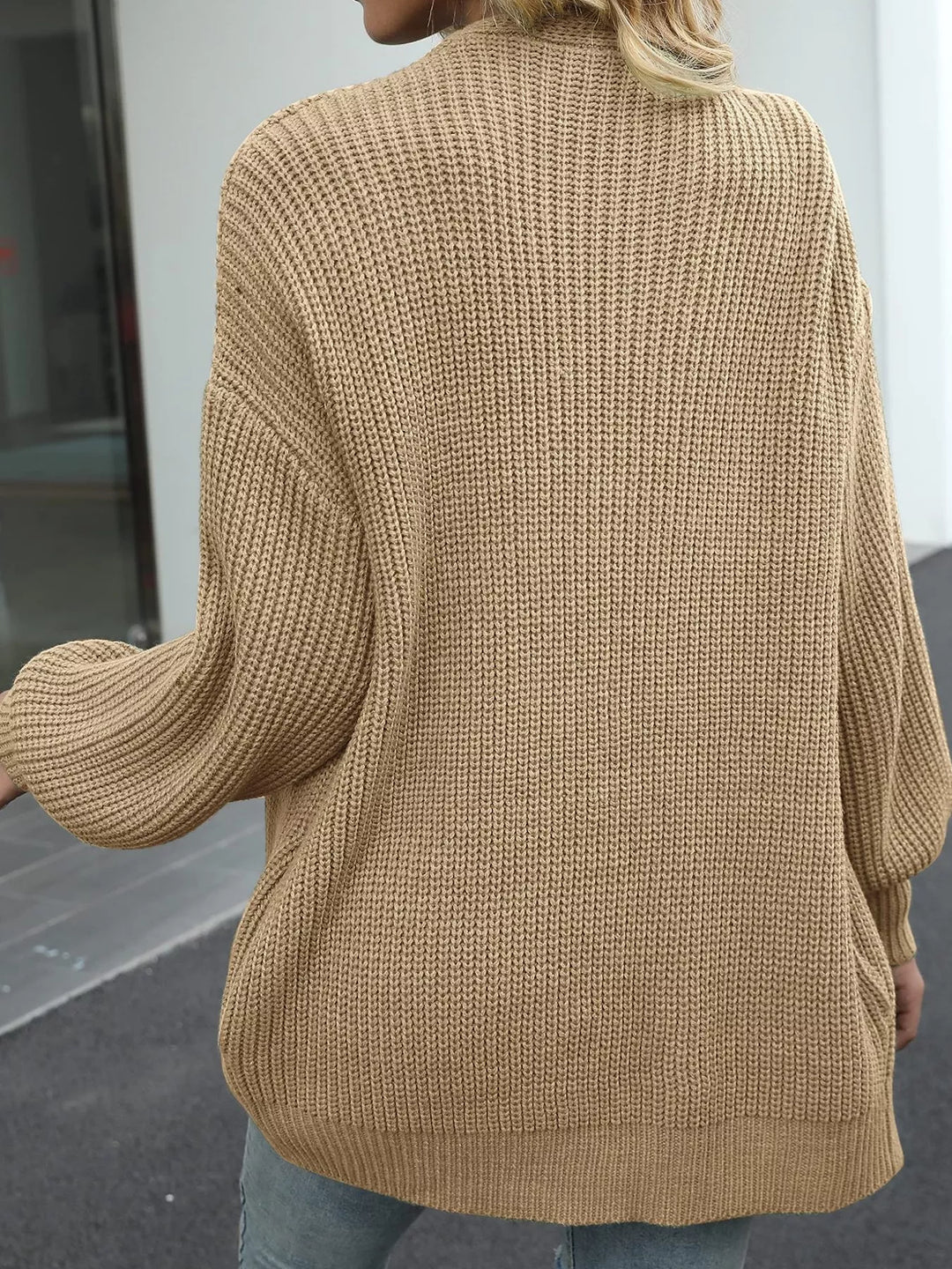 Back view of the camel oversized cardigan with lantern sleeves