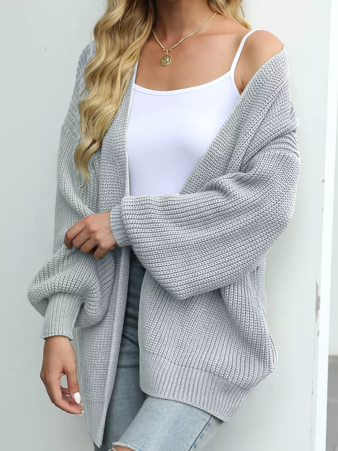 Light gray oversized open front cardigan, angled view with lantern sleeves