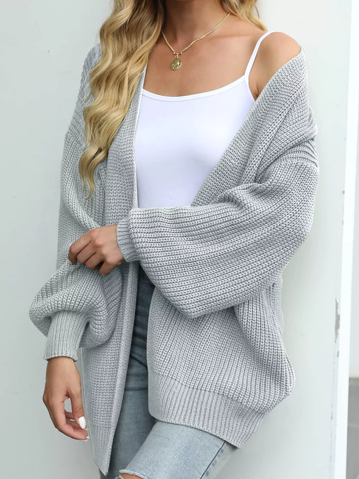 Light gray oversized open front cardigan, angled view with lantern sleeves