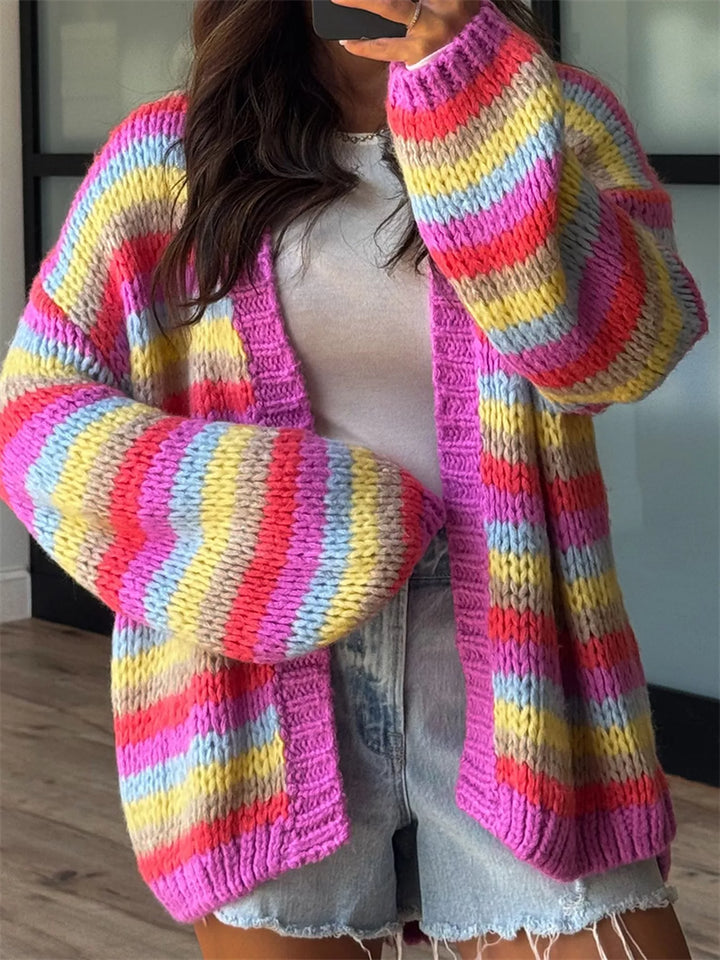Rainbow stripe oversized cardigan with a bright pink ribbed front band