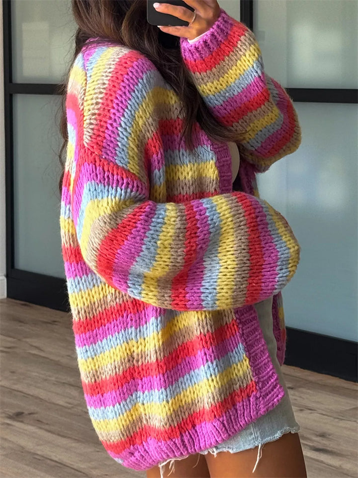 Side view of the rainbow stripe cardigan showing the voluminous sleeve
