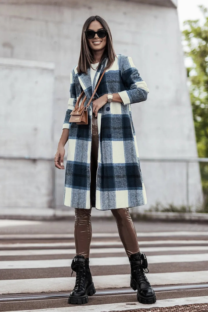 Navy plaid coat full length styled with brown leather pants and black boots