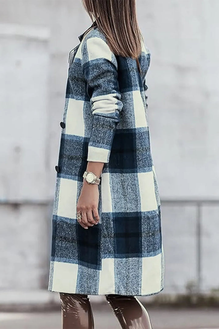 Navy plaid coat side view with the model facing away