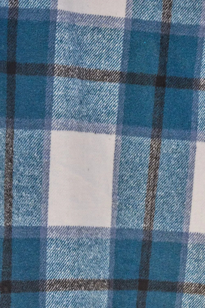 Close-up of teal plaid fabric with brown and cream lines