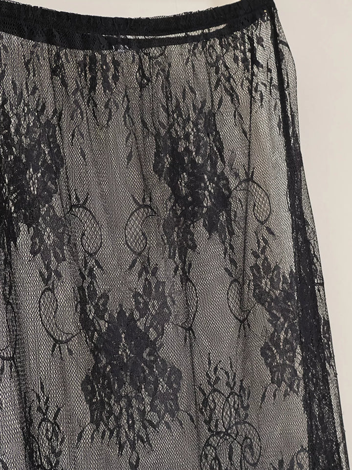 Close-up of the black floral lace overlay skirt and waistband