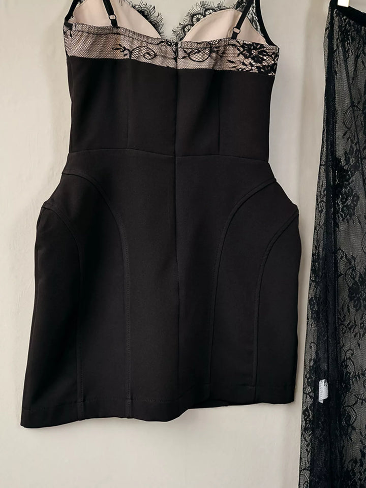 Black structured mini skirt shape with the lace overlay at the side