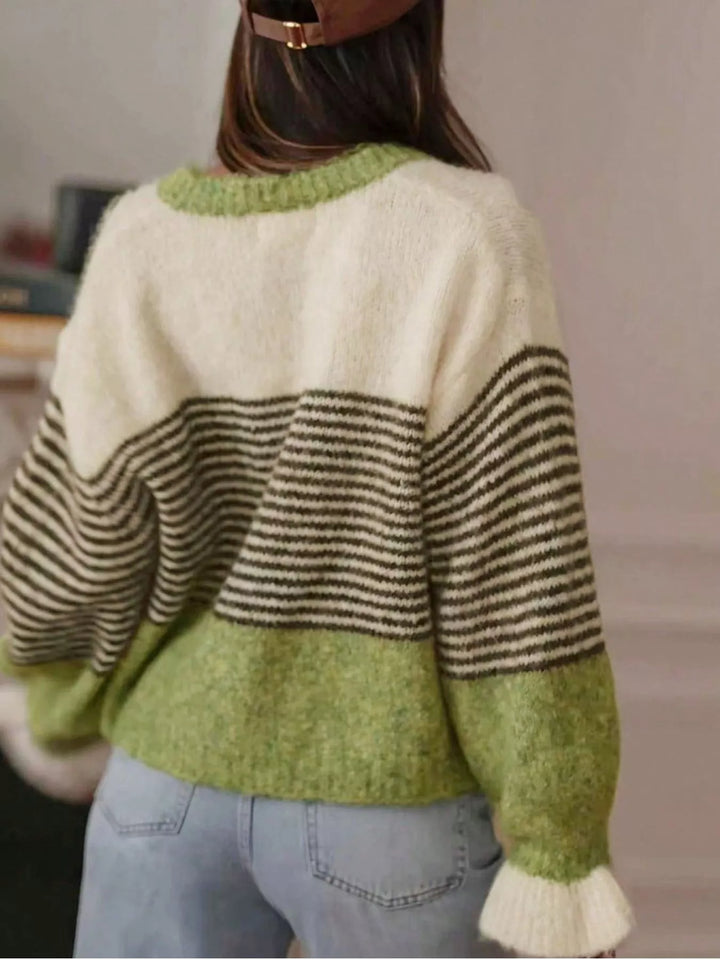 Back view of the green color block cardigan with balloon sleeves