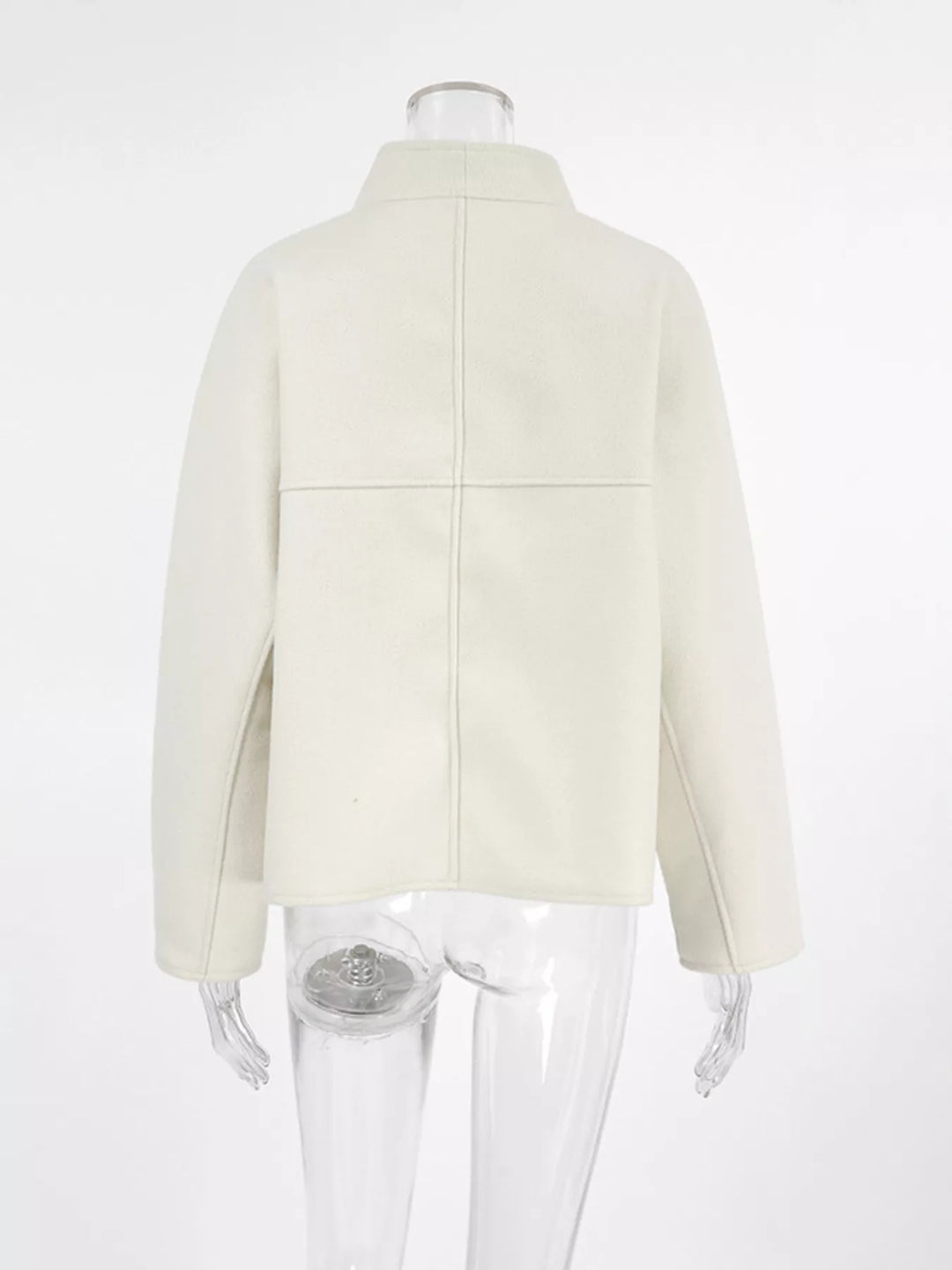 Ivory cropped jacket on a mannequin, back view