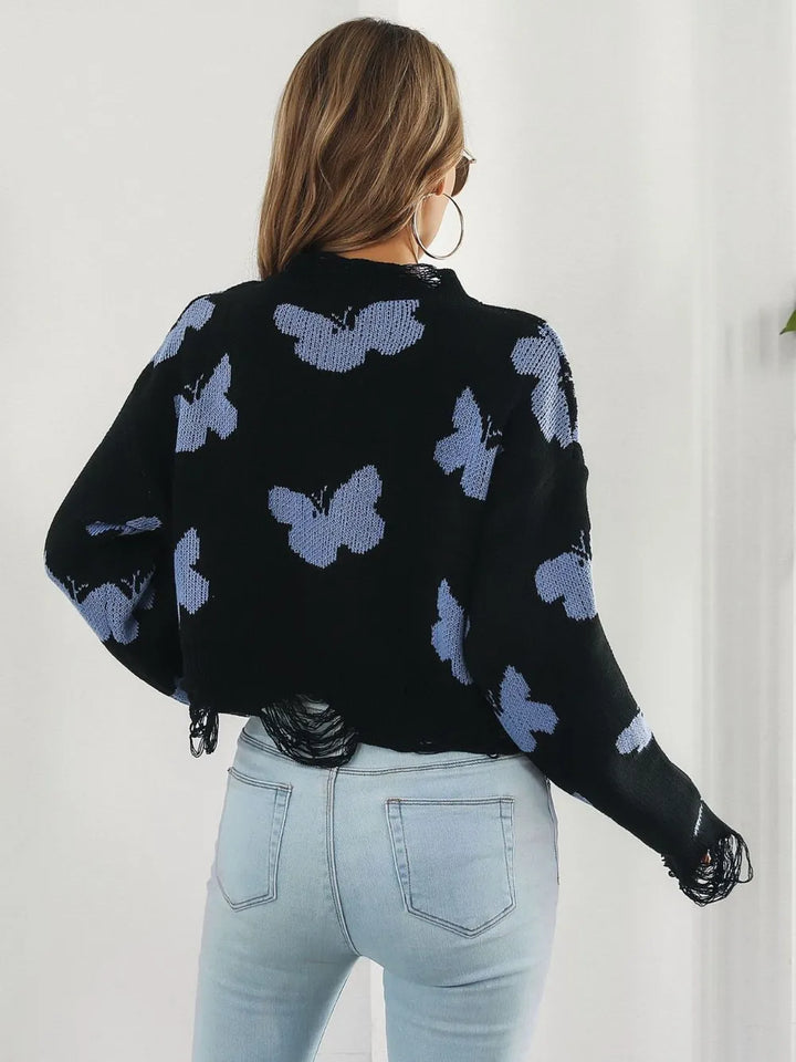 Back view of the black cropped sweater with butterfly print