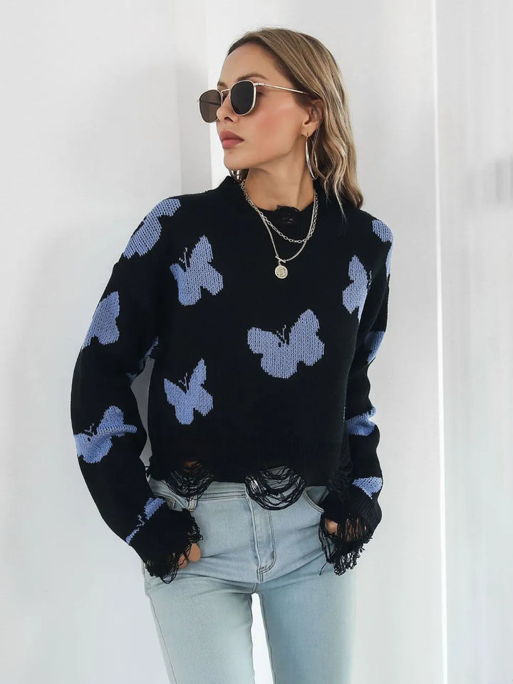 Black crew neck cropped sweater, standing pose with sunglasses