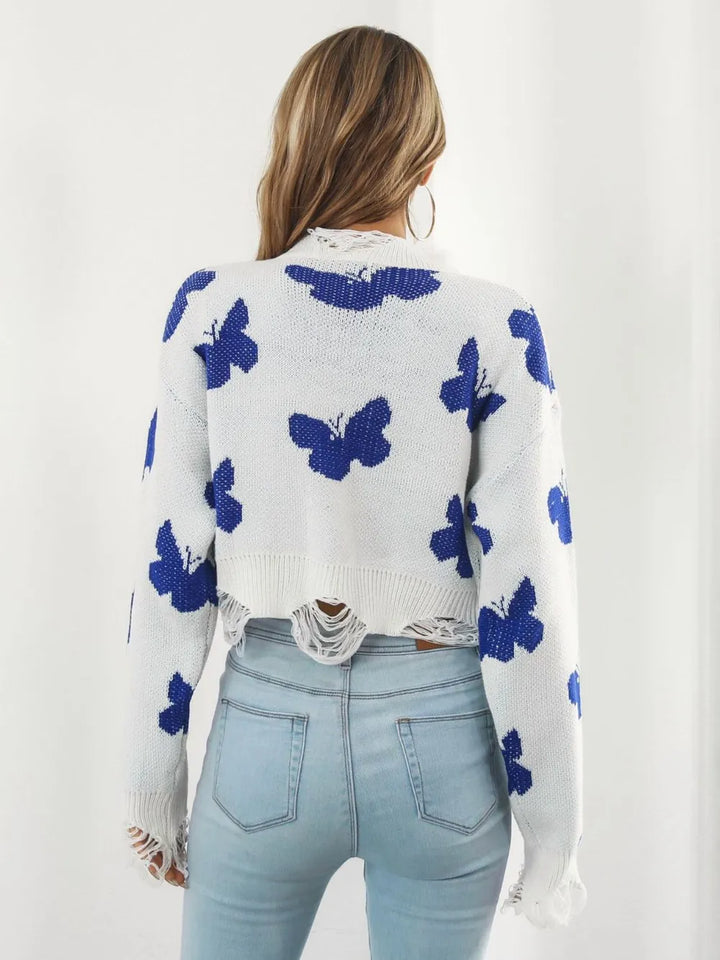 Back view of the white cropped sweater with scattered butterflies