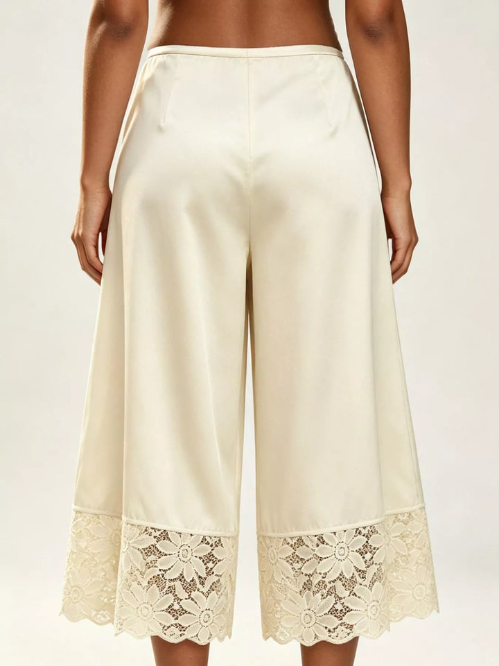 Back view of the champagne cropped wide leg pants with lace hem