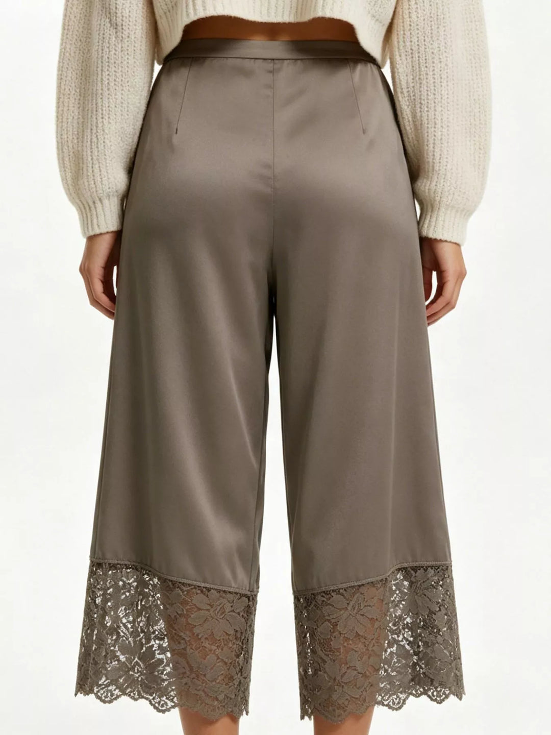 Back view of the mocha cropped pants with scalloped lace hem