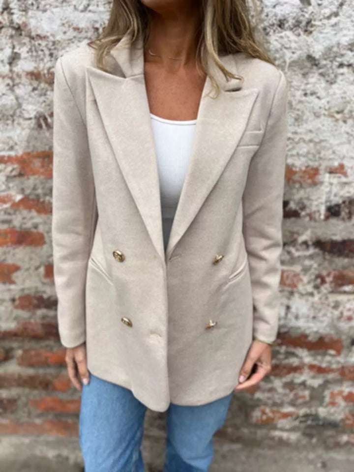 Women's oatmeal double breasted blazer, relaxed oversized hip length, worn over a white top