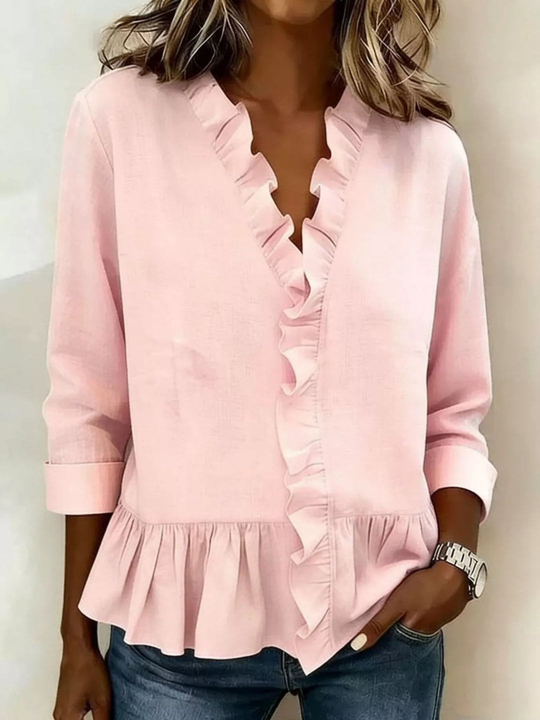 Women's dressy top in pink, ruffle front peplum hem relaxed v-neck